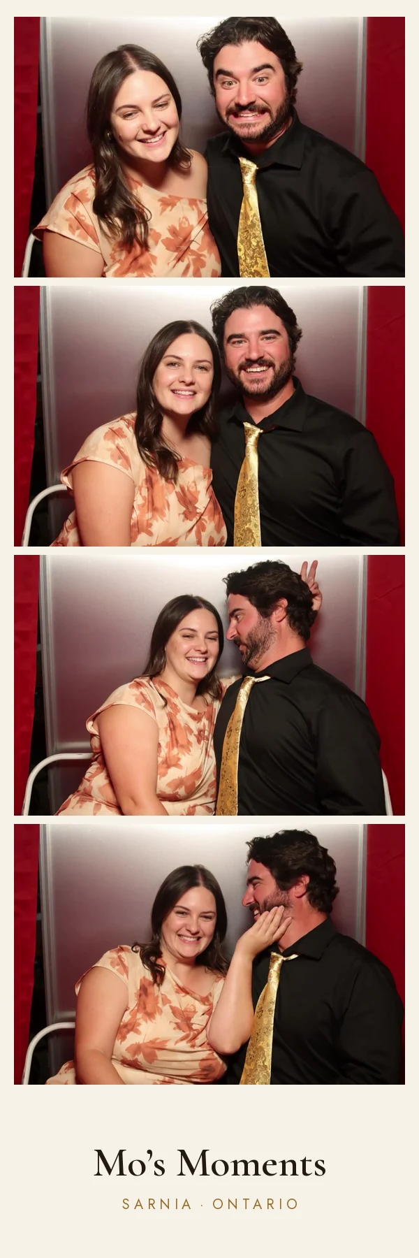 Two guests posing for four photos in the booth