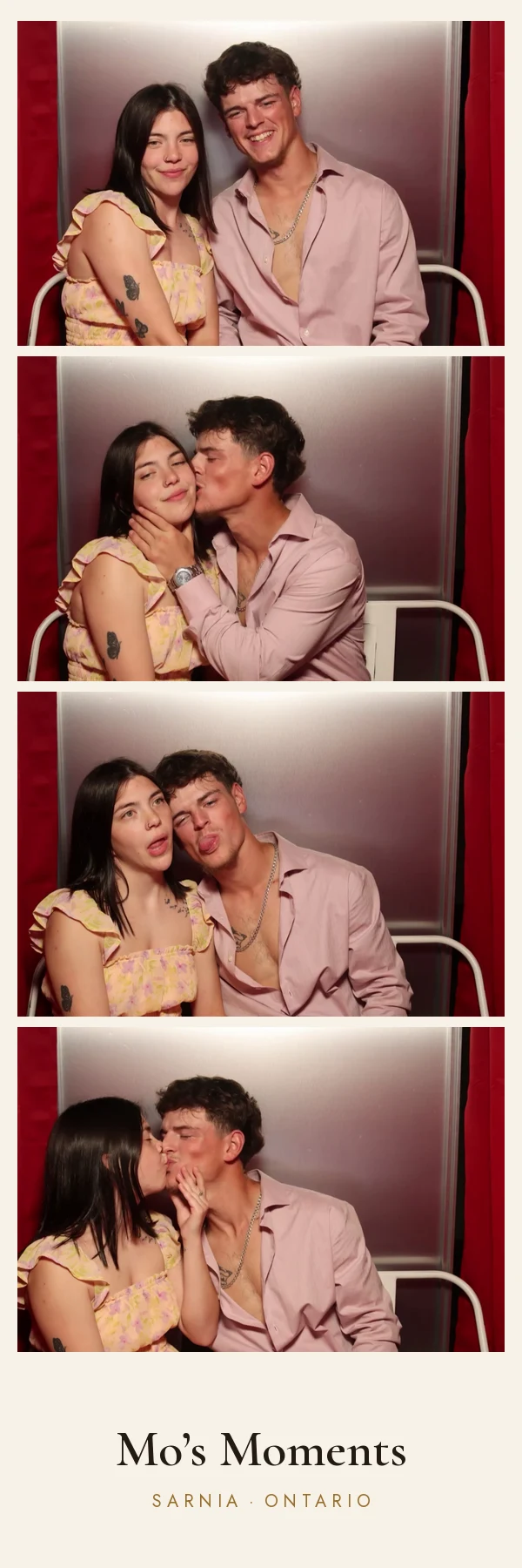 Two guests posing for four photos in the booth